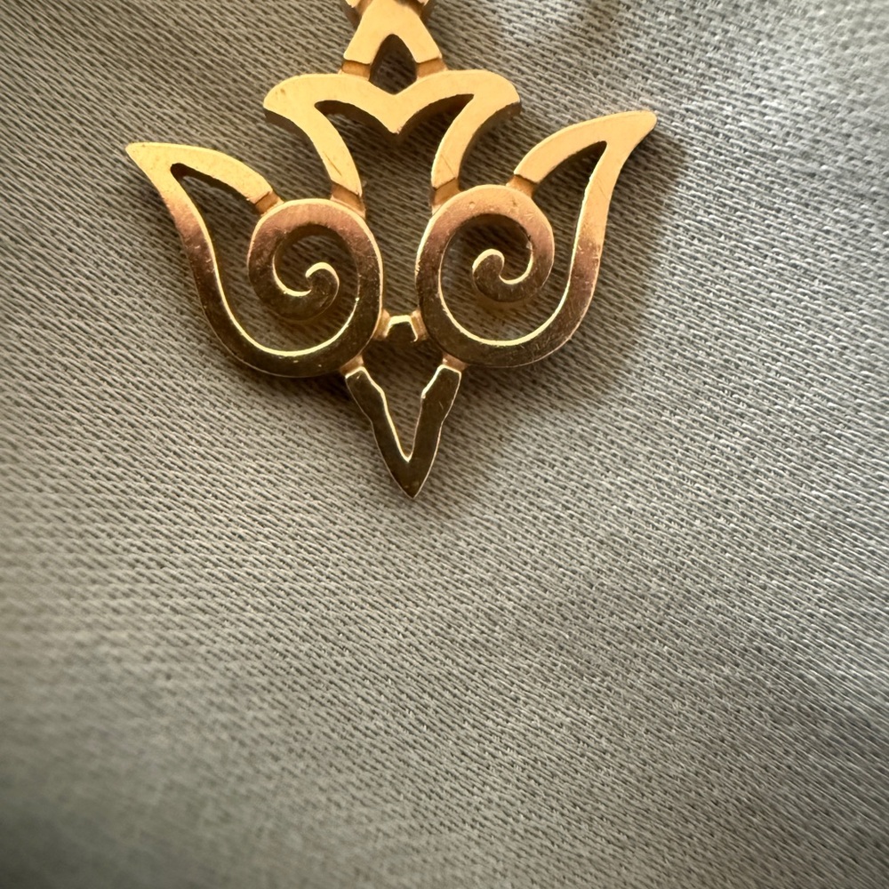 Elegant James Avery gold charm